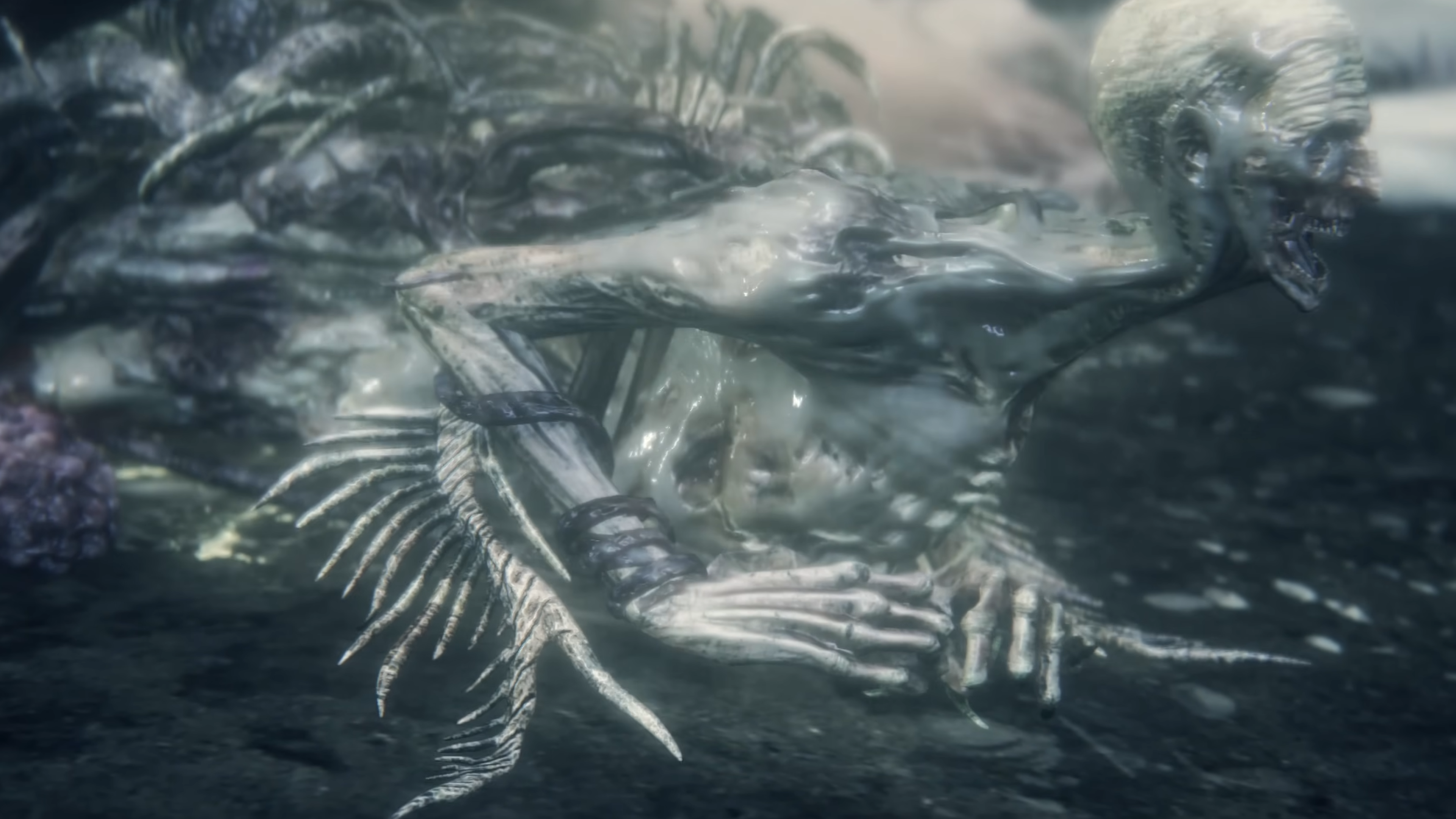 A grey, wet, skeletal humanoid creature crawls out of a grey organic mass, a tendril snaked around its arm.
